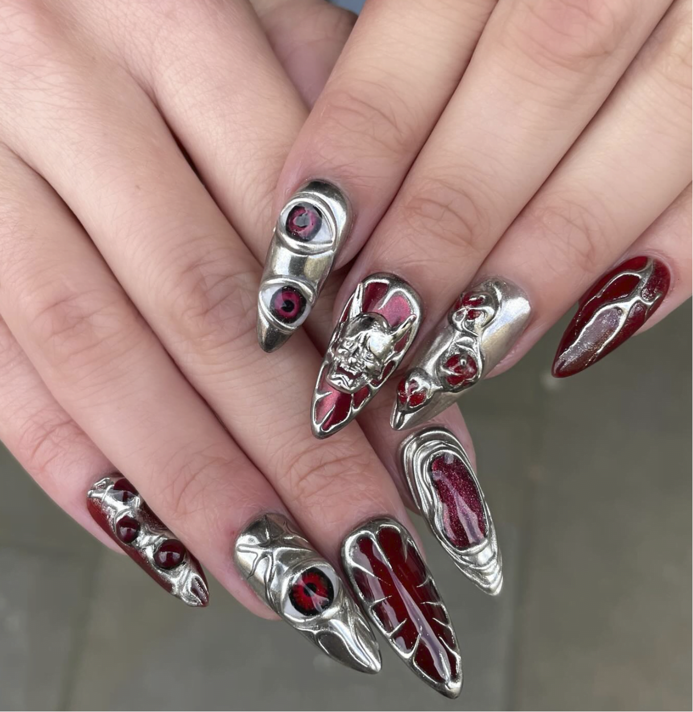 Red and chrome intricate nail art by Lisa