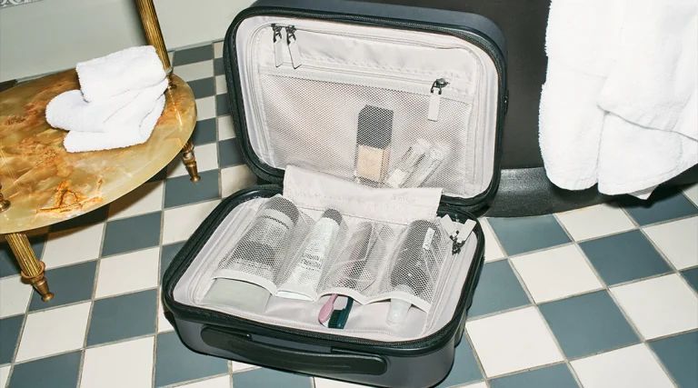 Suitcase packing beauty products