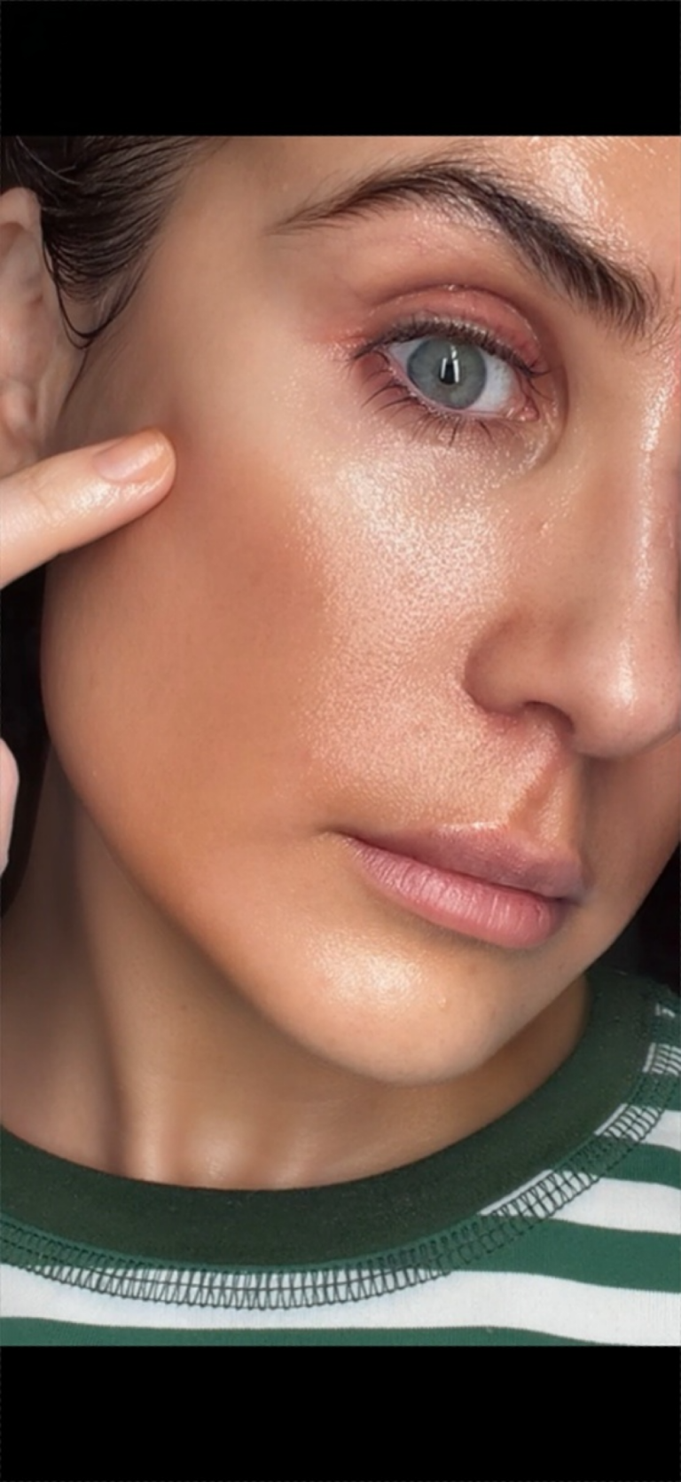 Amy Mataczynski applying PDRN cream